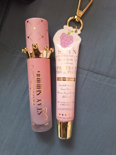 Customer photo of a lip conditioner and keyring